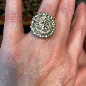 This is 925 sterling silver ring of all clear stones not diamonds.